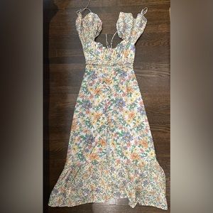 Floral print, summer dress. Milkmaid style ruching, dainty buttons and strings.